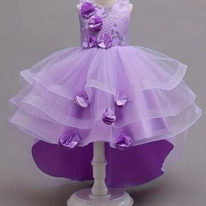 Elegant handmade Aqua Dress with Ruffles $Floral Accents. colors, purple,blue